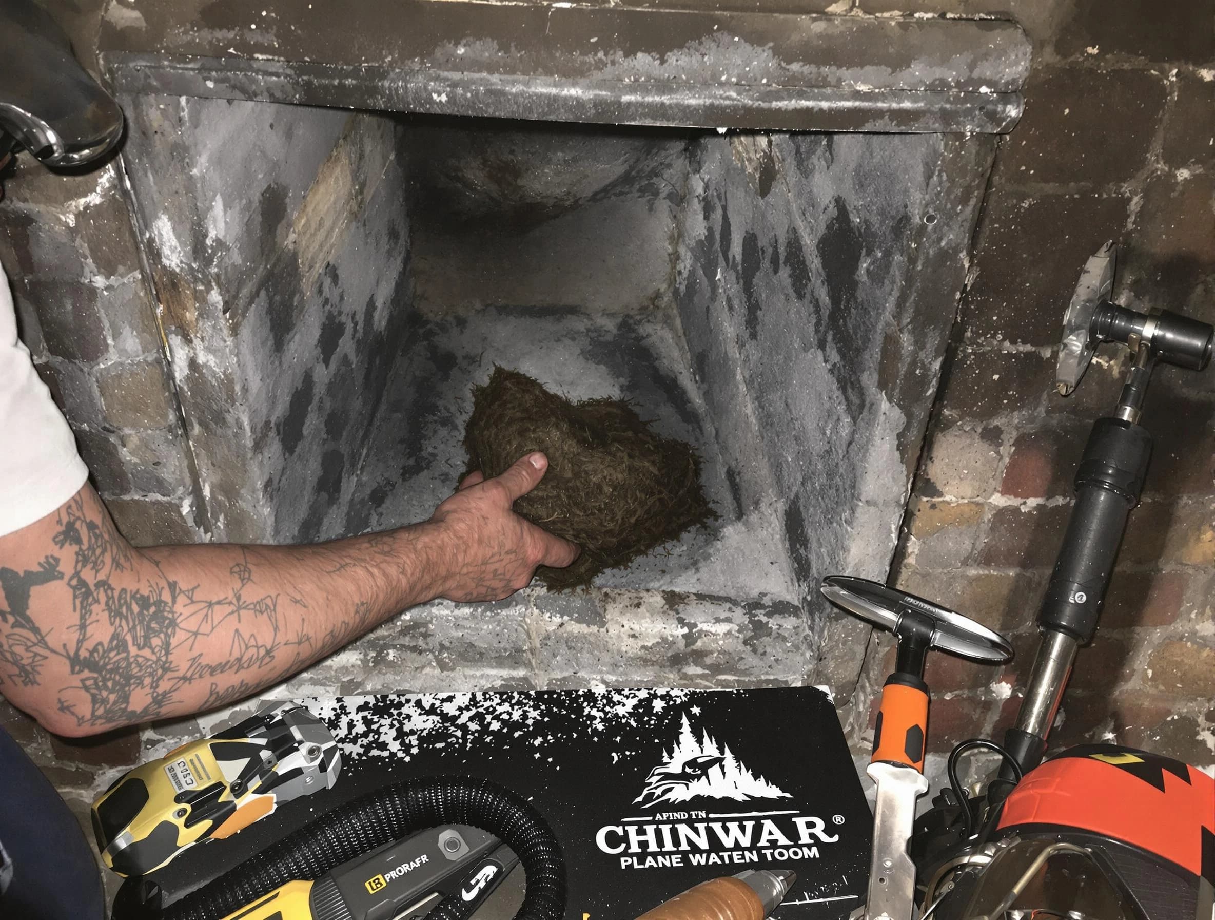Talladega Chimney Sweep safely removing debris and screening chimney in Talladega, AL